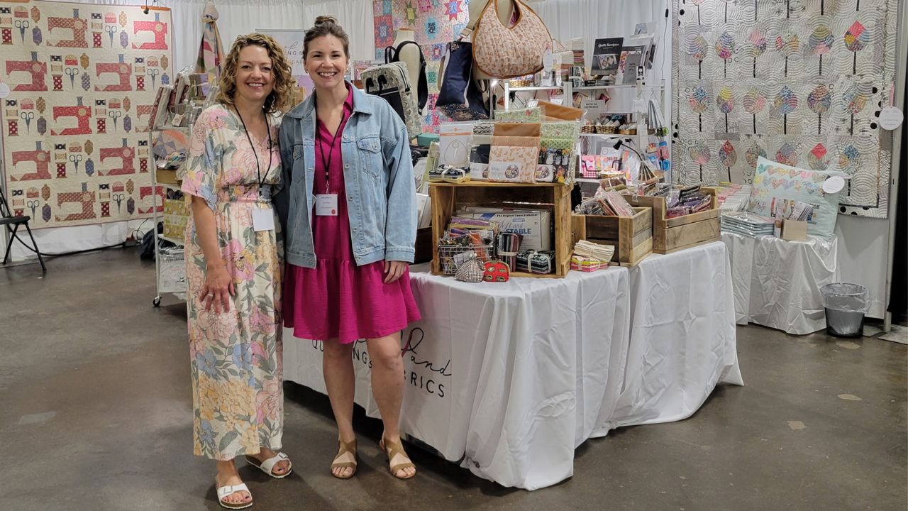 Quilt Canada 2025 - Mississauga, Ontario - Jamie and Leslie at Booth 218